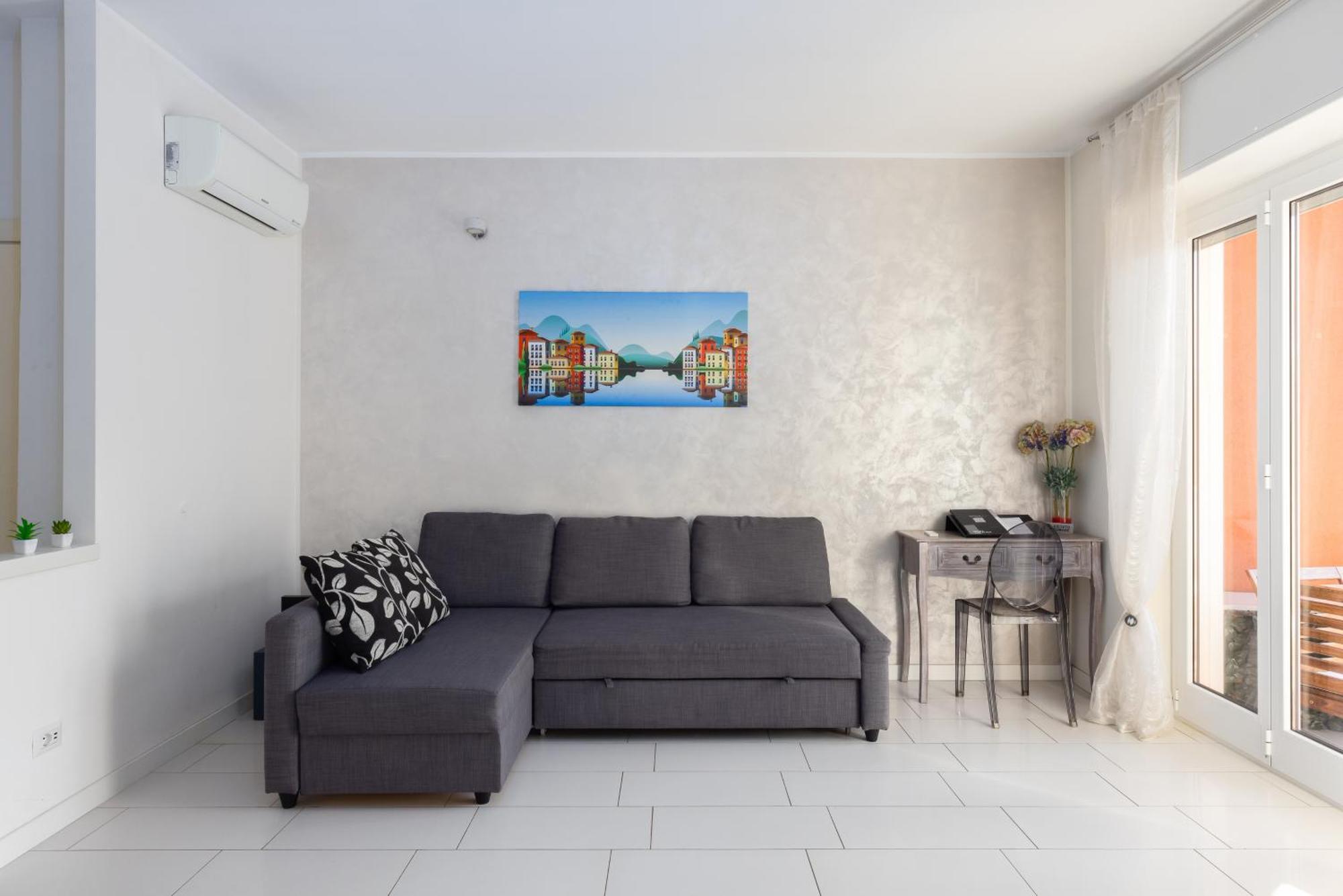 Terrazza Sul Lago - Open Space E Netflix Lecco Bagian luar foto